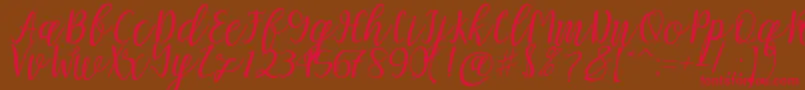 Mellitta script Font – Red Fonts on Brown Background