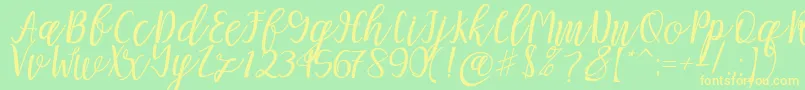 Mellitta script Font – Yellow Fonts on Green Background