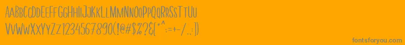 MellonerFunRegular-fontti – harmaat kirjasimet oranssilla taustalla