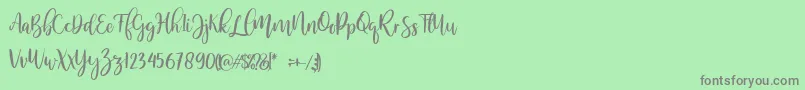 MellonerRegular Font – Gray Fonts on Green Background