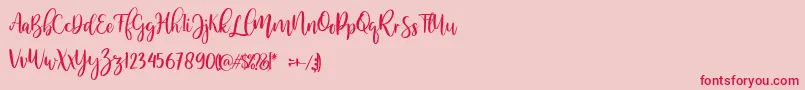 MellonerRegular Font – Red Fonts on Pink Background
