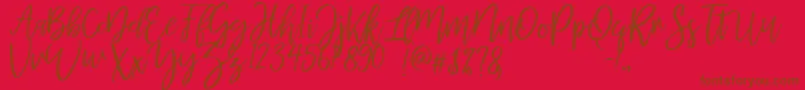 mellony dry brush-Schriftart – Braune Schriften auf rotem Hintergrund