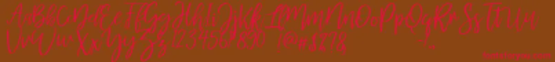 Police mellony dry brush – polices rouges sur fond brun