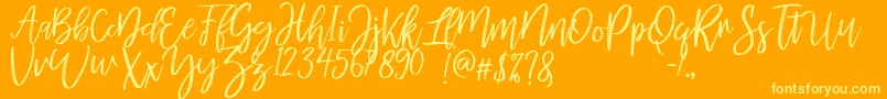 mellony dry brush-Schriftart – Gelbe Schriften auf orangefarbenem Hintergrund