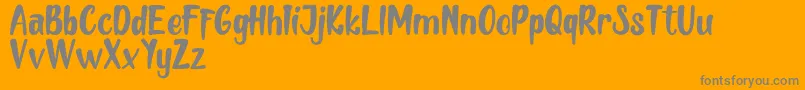 Fonte MELLOW   DEMO – fontes cinzas em um fundo laranja