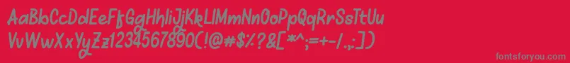Mellows-fontti – harmaat kirjasimet punaisella taustalla