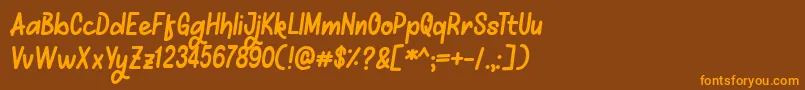 フォントMellows – オレンジ色の文字が茶色の背景にあります。