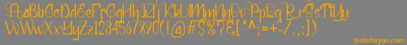 Mellunker Font – Orange Fonts on Gray Background