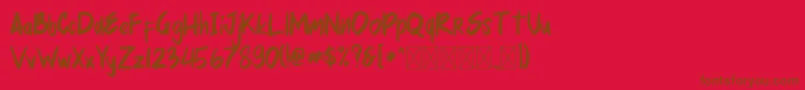 mellurack Font – Brown Fonts on Red Background