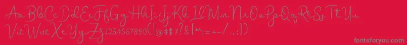 フォントmelodie – 赤い背景に灰色の文字