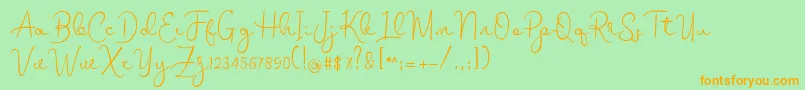 melodie Font – Orange Fonts on Green Background