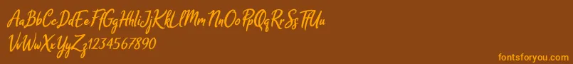 Melodya Chatrina Italic Font – Orange Fonts on Brown Background