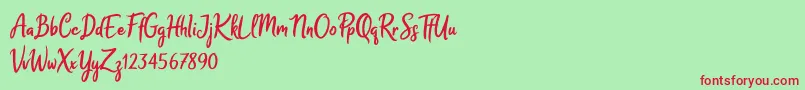 Melodya Chatrina Font – Red Fonts on Green Background