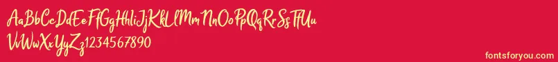 Melodya Chatrina Font – Yellow Fonts on Red Background