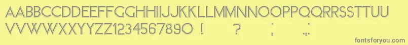Member-fontti – harmaat kirjasimet keltaisella taustalla