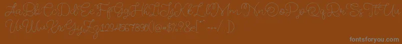 フォントMemory of 2018 – 茶色の背景に灰色の文字