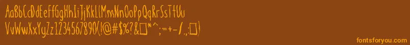 Шрифт meninpink Regular – оранжевые шрифты на коричневом фоне