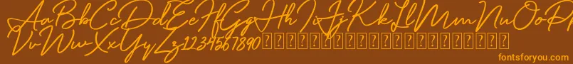 Mentawai Font – Orange Fonts on Brown Background