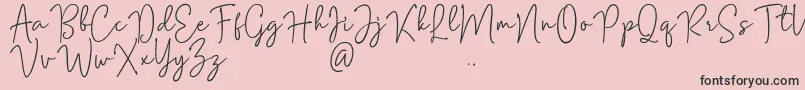 Mention Signature Font – Black Fonts on Pink Background