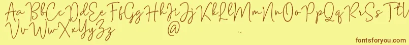 Mention Signature Font – Brown Fonts on Yellow Background