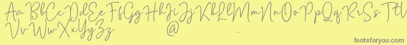 Czcionka Mention Signature – szare czcionki na żółtym tle