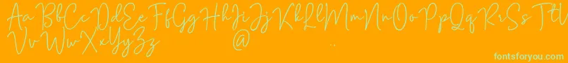 Mention Signature Font – Green Fonts on Orange Background