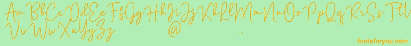 Mention Signature Font – Orange Fonts on Green Background