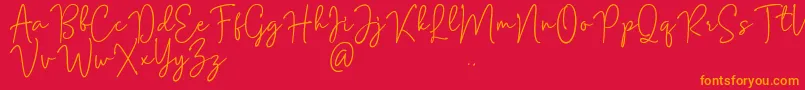 Mention Signature-Schriftart – Orangefarbene Schriften auf rotem Hintergrund