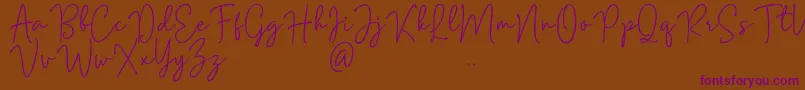 Mention Signature-Schriftart – Violette Schriften auf braunem Hintergrund