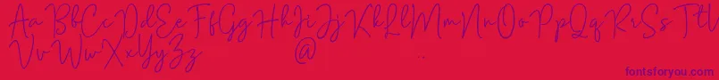 フォントMention Signature – 赤い背景に紫のフォント