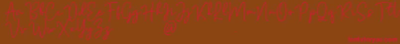 Mention Signature Font – Red Fonts on Brown Background