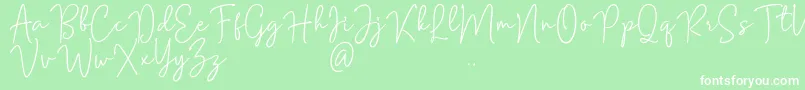 フォントMention Signature – 緑の背景に白い文字