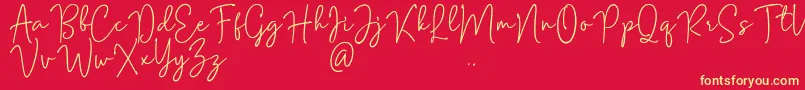 フォントMention Signature – 黄色の文字、赤い背景