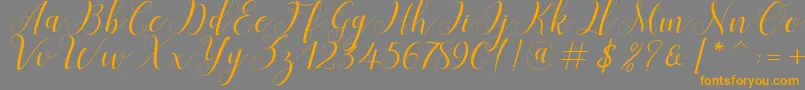 Menttion Script-Schriftart – Orangefarbene Schriften auf grauem Hintergrund