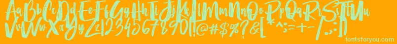 Merci Heart Brush Font – Green Fonts on Orange Background
