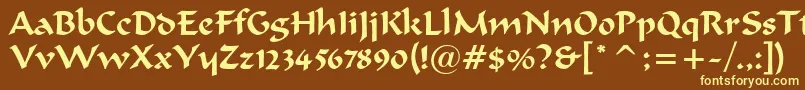 merlin-fontti – keltaiset fontit ruskealla taustalla