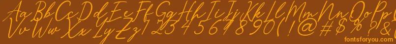 Merrxi Font – Orange Fonts on Brown Background