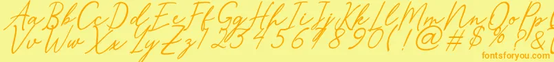 Merrxi-Schriftart – Orangefarbene Schriften auf gelbem Hintergrund
