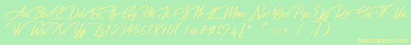 Merry christmas-Schriftart – Gelbe Schriften auf grünem Hintergrund