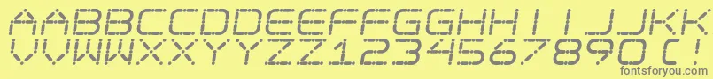 フォントEgotripS – 黄色の背景に灰色の文字