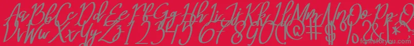MeryQolbyItalic-Schriftart – Graue Schriften auf rotem Hintergrund