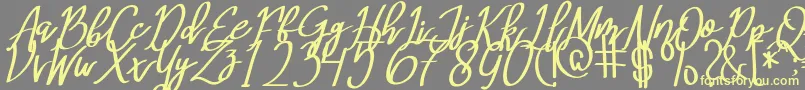 MeryQolbyItalic-Schriftart – Gelbe Schriften auf grauem Hintergrund
