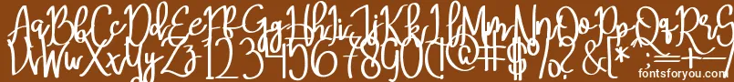 Czcionka MeryQolbyRegular – białe czcionki na brązowym tle