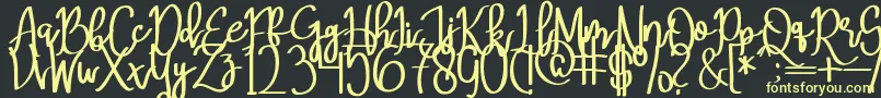 MeryQolbyRegular Font – Yellow Fonts on Black Background