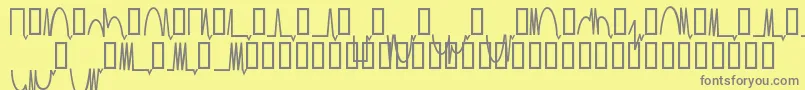 Fonte Mesaam   – fontes cinzas em um fundo amarelo