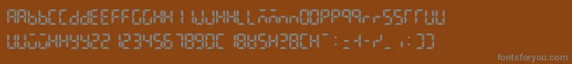 Lcdattphonetimedate-Schriftart – Graue Schriften auf braunem Hintergrund