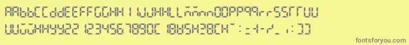 Lcdattphonetimedate Font – Gray Fonts on Yellow Background