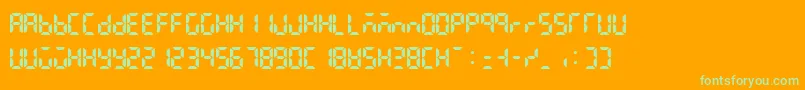 Lcdattphonetimedate-Schriftart – Grüne Schriften auf orangefarbenem Hintergrund