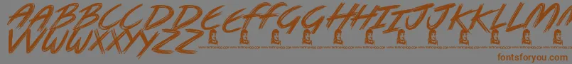 フォントMetal Head – 茶色の文字が灰色の背景にあります。