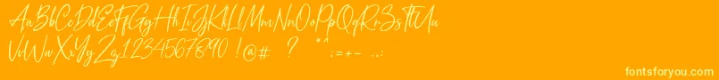 Metal Pen Font – Yellow Fonts on Orange Background